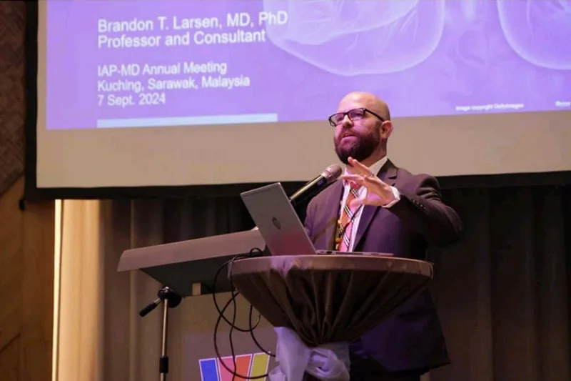 Professor Brandon Larsen